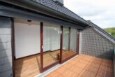 Großzügige Dachgeschosswohnung im Grünen - Bild