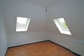 Großzügige Dachgeschosswohnung im Grünen - Bild