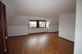 Großzügige Dachgeschosswohnung im Grünen - Bild
